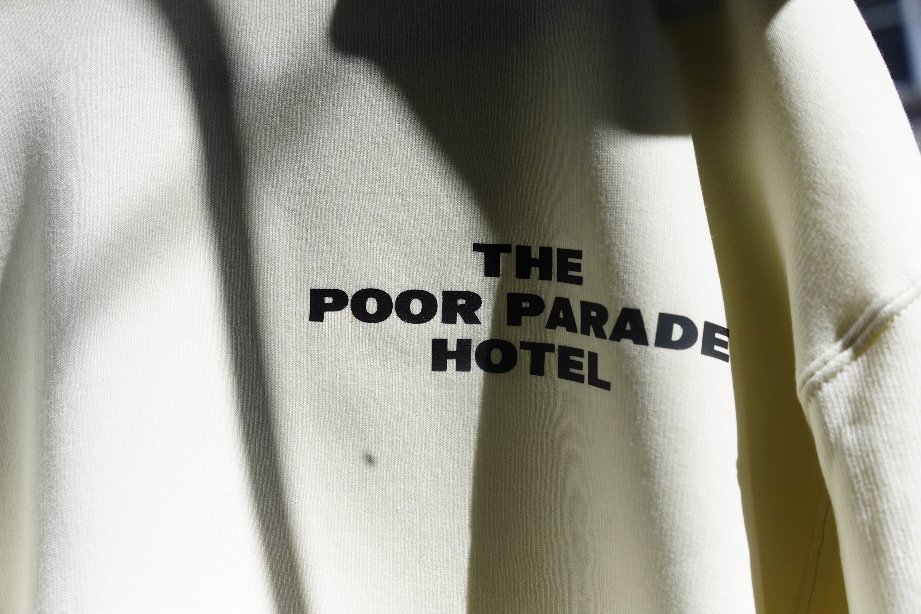 The Poor Parade Hotel Hoodie